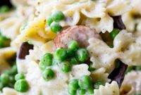 Creamy Pesto Alfredo Skillet Pasta with Chicken Sausage and Peas