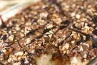 Ultimate Candy Bar Poke Cake