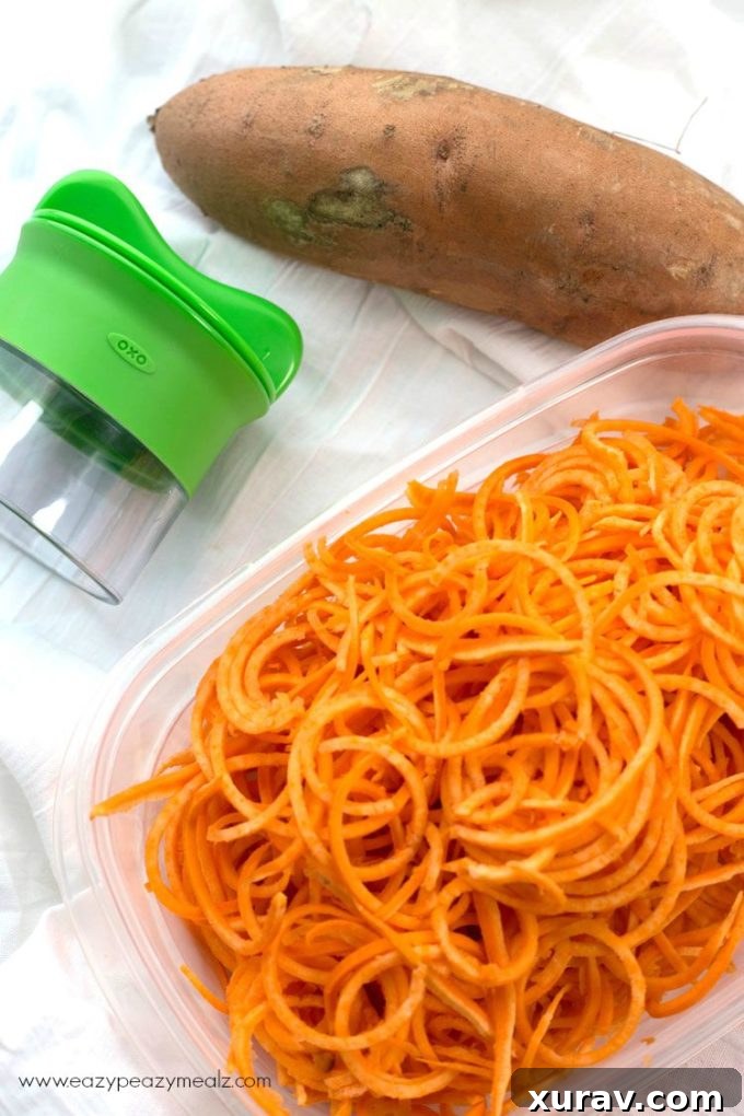 Close-up of spiralized zucchini and sweet potato noodles