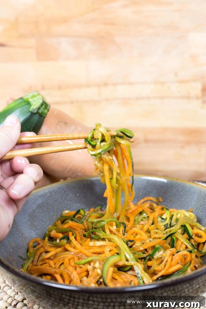 Stir fry veggie noodles plated, showing the beautiful colors and texture