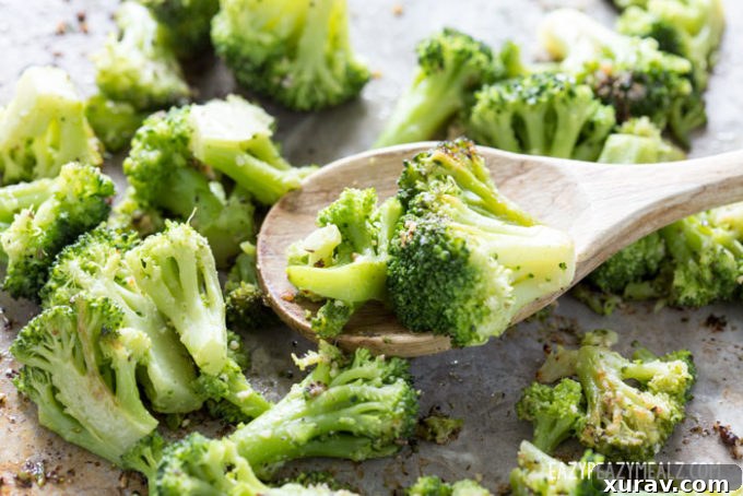 Perfectly roasted broccoli florets infused with garlic, ready to be served as a healthy and flavorful side.