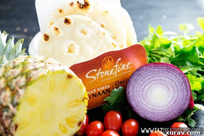 Essential ingredients for crafting delicious and simple naan shrimp tacos, showcasing fresh produce and seafood.