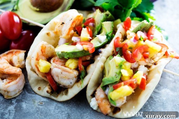 Shrimp tacos, a delicious and simple seafood dinner recipe, bursting with bold flavors and vibrant colors.