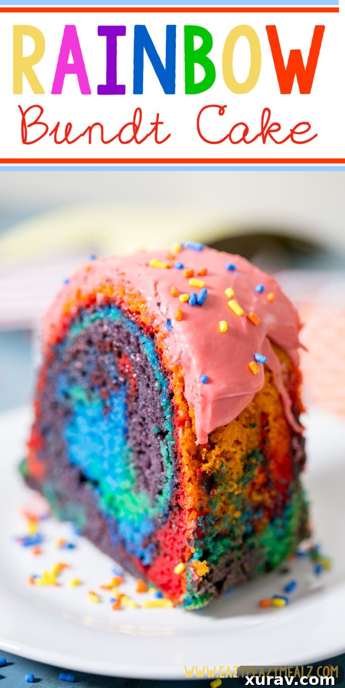 A beautifully sliced Rainbow Bundt Cake, showcasing vibrant colors and a delicate raspberry glaze, ready to be enjoyed.