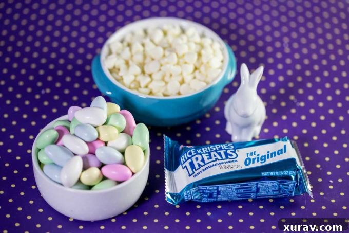 Ingredients laid out for making Rice Krispies Treats Easter Baskets: Rice Krispies Treats bars, pastel sugared almonds, and white chocolate chips.