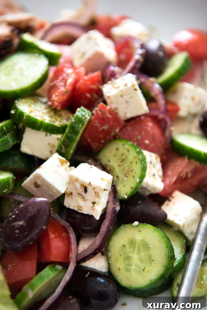 Classic Greek Salad served beautifully, ready for a summer meal or gathering