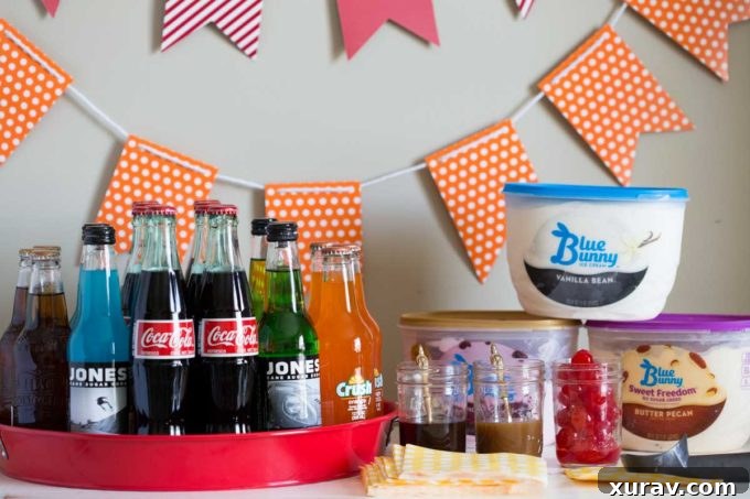 Table setting for an ice cream float bar with various sodas and toppings