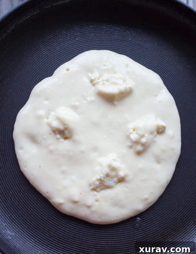 Gallery image of uncooked pancakes with cream cheese dots