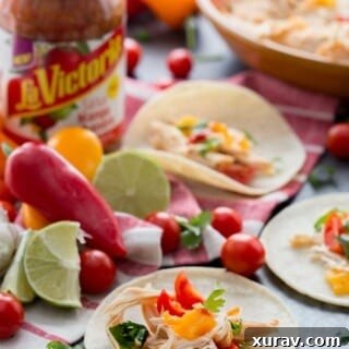 Mango Habanero chicken tacos cooked in the slow cooker. These are so easy!