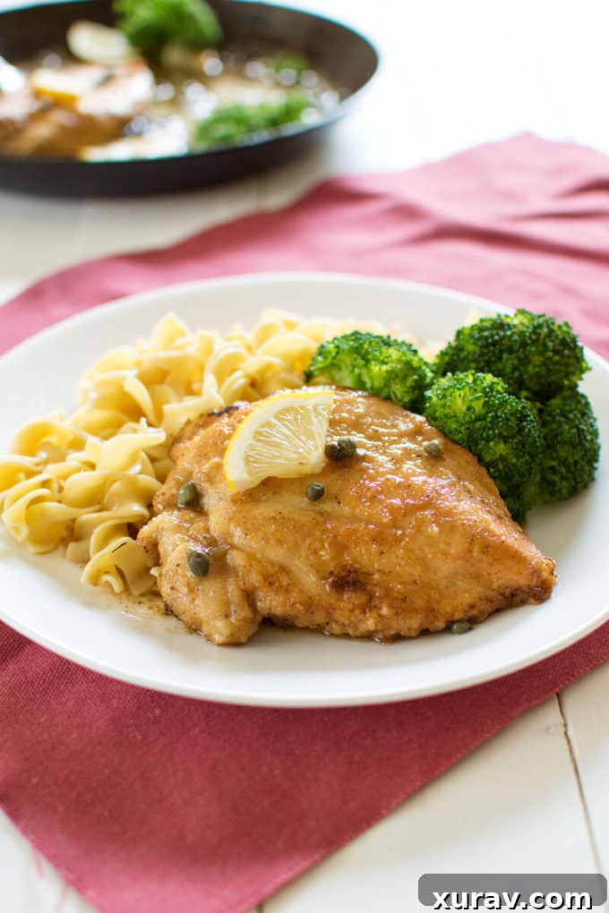 Juicy pan-fried Lemon Chicken Piccata served with pasta