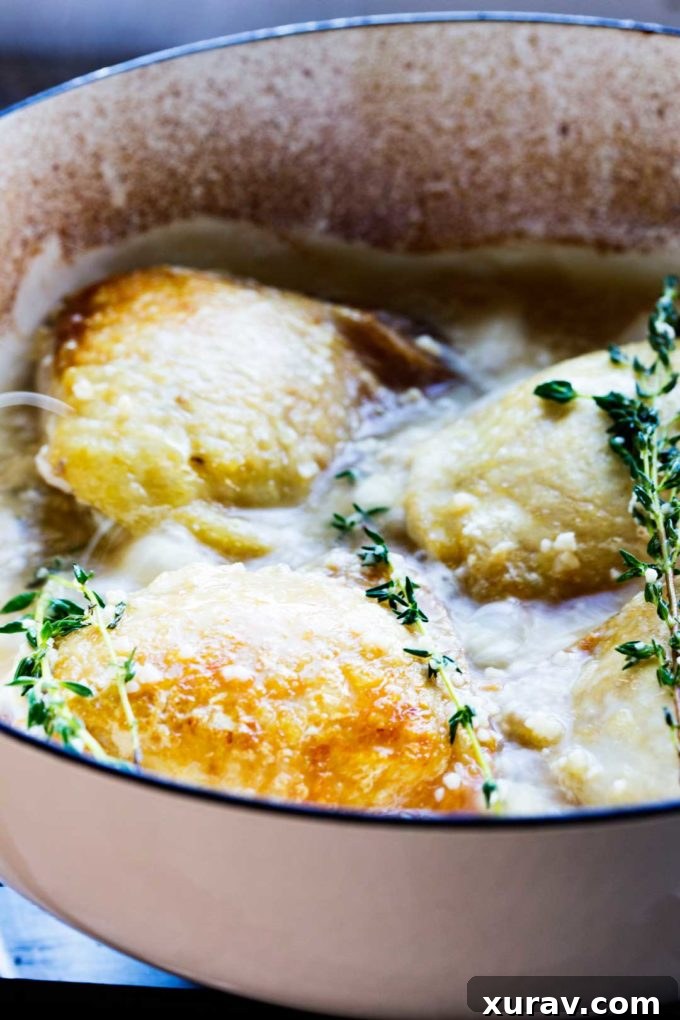 Perfectly cooked Skillet Garlic Lemon Chicken with White Wine Sauce, garnished and ready to serve