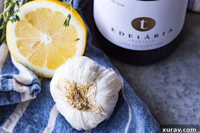 White Garnacha wine being added to cook chicken in a skillet