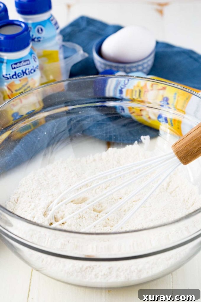 Classic waffle batter in a bowl, showing the simple ingredients before being mixed, an essential step for nutrient-dense classic waffles