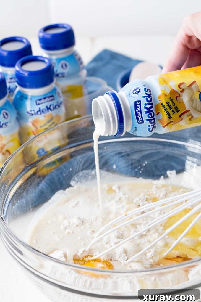 A stack of warm, golden classic waffles, subtly hinting at their special ingredient, perfect for a nutritious and delicious family breakfast