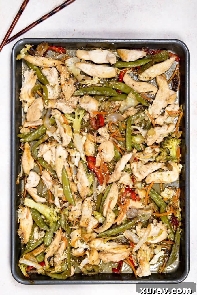 A sheet pan of stir fry with chicken, great flavor, and low mess