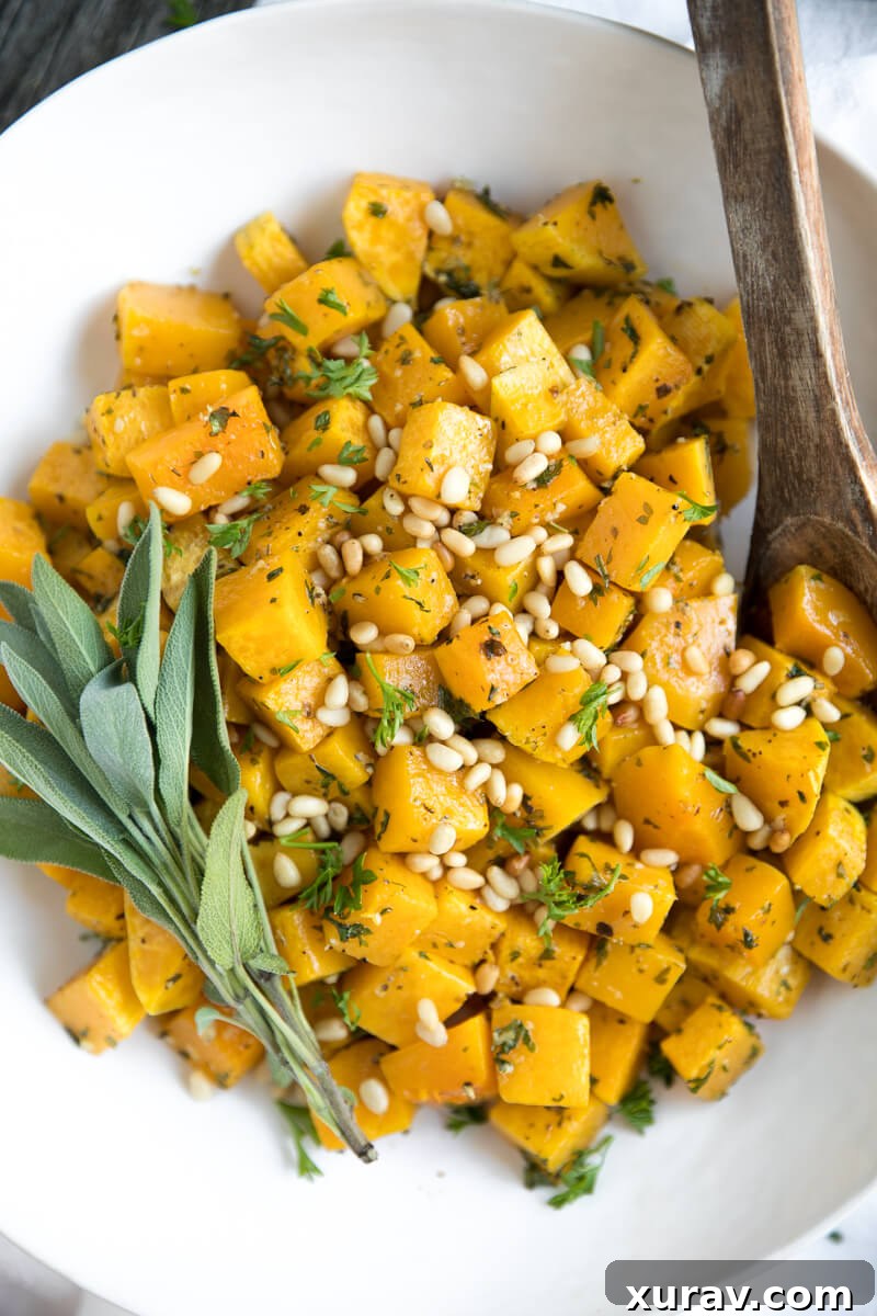 5 Ingredient Oven Roasted Garlic and Herb Butternut Squash with Pine Nuts - a perfect fall side dish