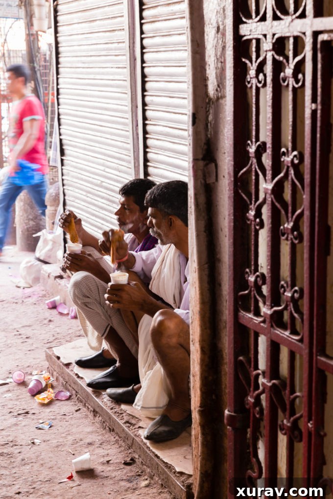 Friends enjoying an afternoon snack break in Old Delhi India