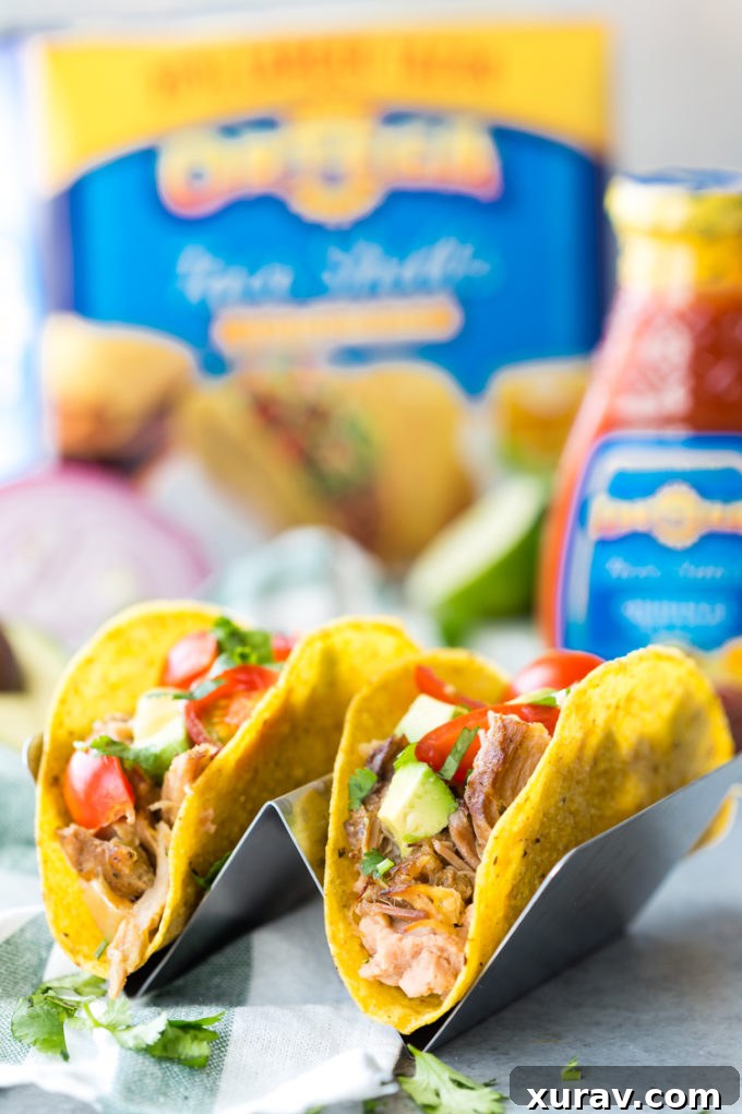 Delicious Slow Cooker Pork Carnitas Tacos, slow-cooked to perfection and ready for assembly