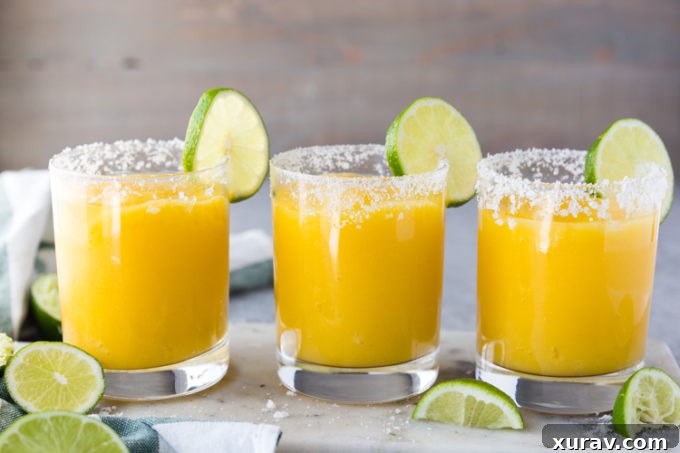 All lined up, frozen mango margaritas