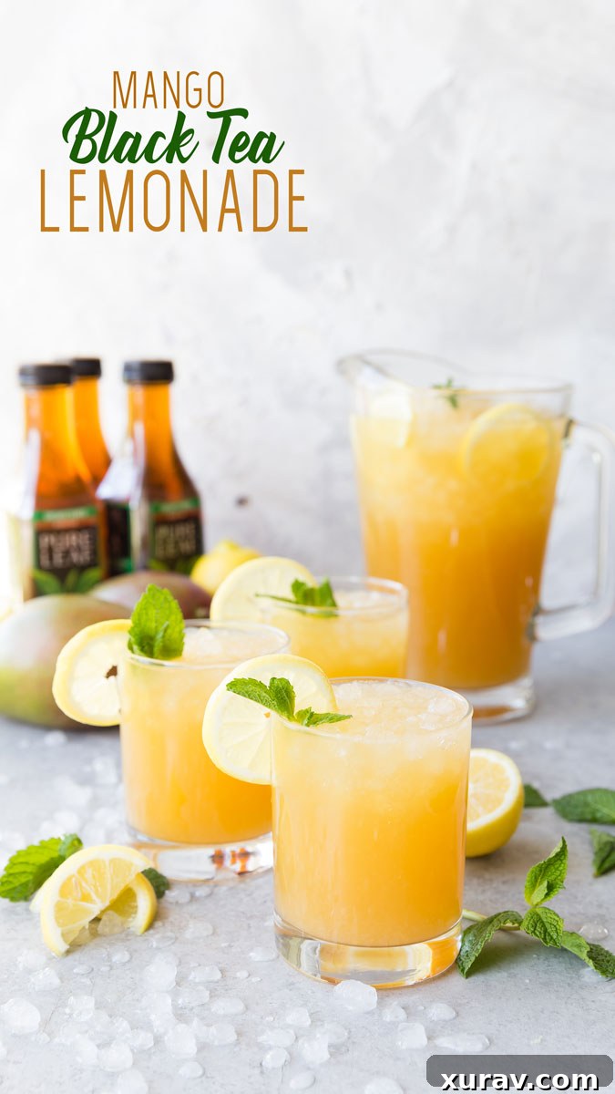 Mango Black Tea Lemonade- A fantastic summer beverage that is as refreshing as it is delicious. Made with fresh squeezed lemon juice, mango nectar, and black tea.