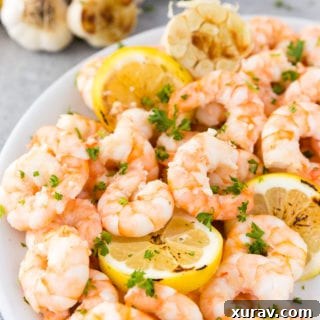 Garlic butter shrimp with fresh parsley and lemon