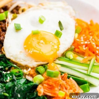 White bowl filled with bibimbap