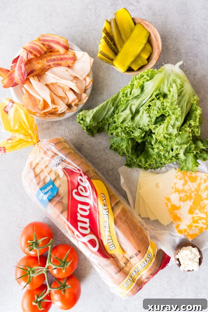 Effortless Chicken Club Stack 3 Ingredients for Easy Chicken Club Sandwich featuring Sara Lee Butter Bread, cheese, deli chicken, and fresh produce.