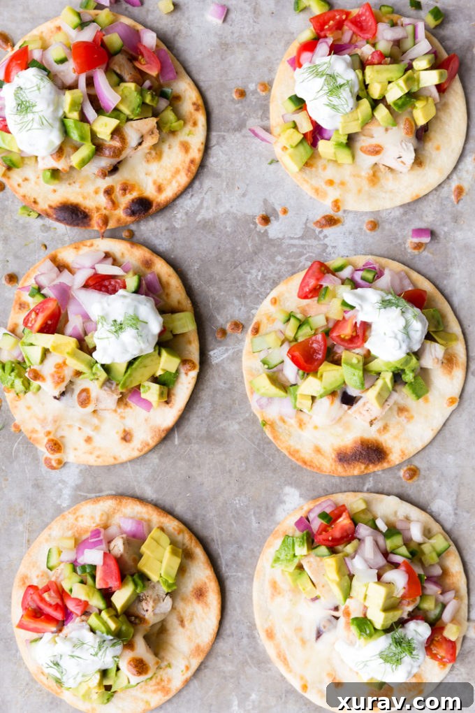 A sheet pan with 6 greek street tacos 
