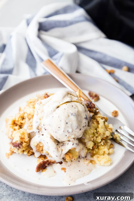 Delicious Crockpot Crunchy Pecan Apple Cobbler, warm and inviting, perfect for fall