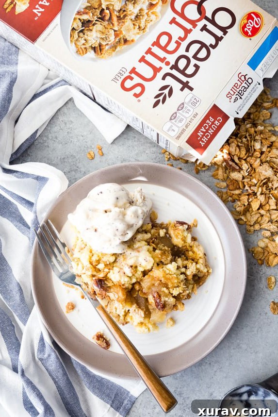Close-up of golden brown Crockpot Crunchy Pecan Apple Cobbler, ready to serve