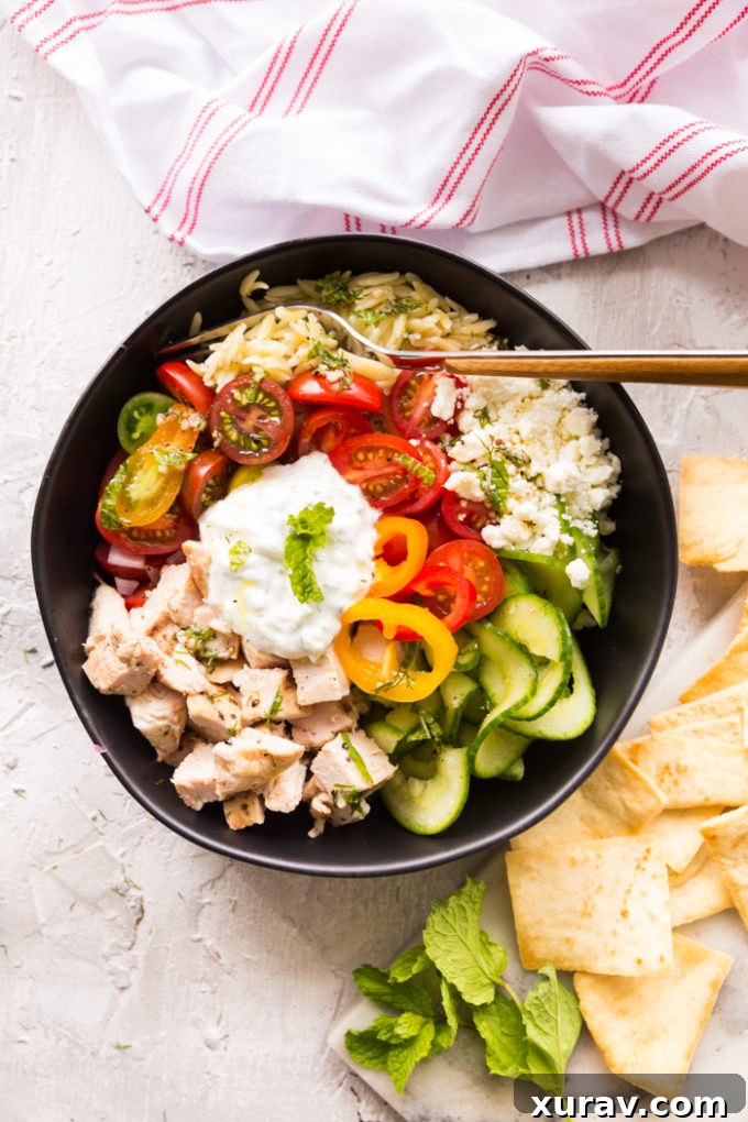 A vibrant and easy-to-make Greek Chicken Orzo Pasta Power Bowl
