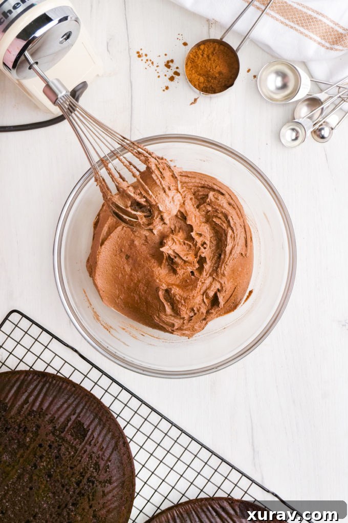 Chocolate buttercream icing or frosting being piped
