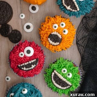 Monster Halloween Cupcakes- Grass icing tip, colored frosting, eye balls, and OREO cookies