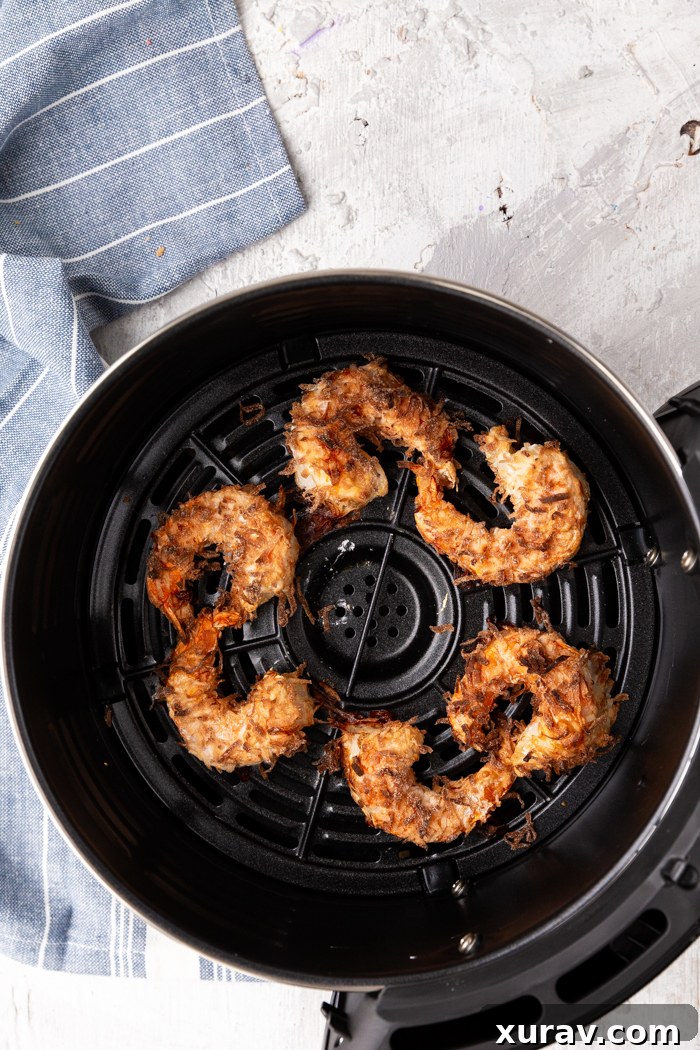 A delicious air-fried recipe for coconut shrimp, golden and perfectly cooked