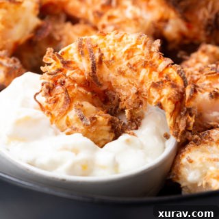 Air fryer coconut shrimp- the crispy coconut shrimp that is like you deep fried it, but without the extra oil and calories.