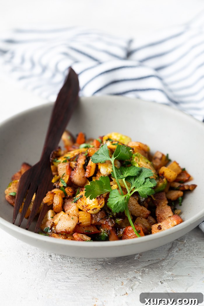 breakfast hash vertical shot in bowl with towel