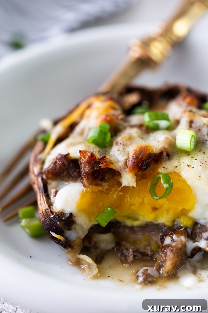 A white plate with a breakfast portobello mushroom on top