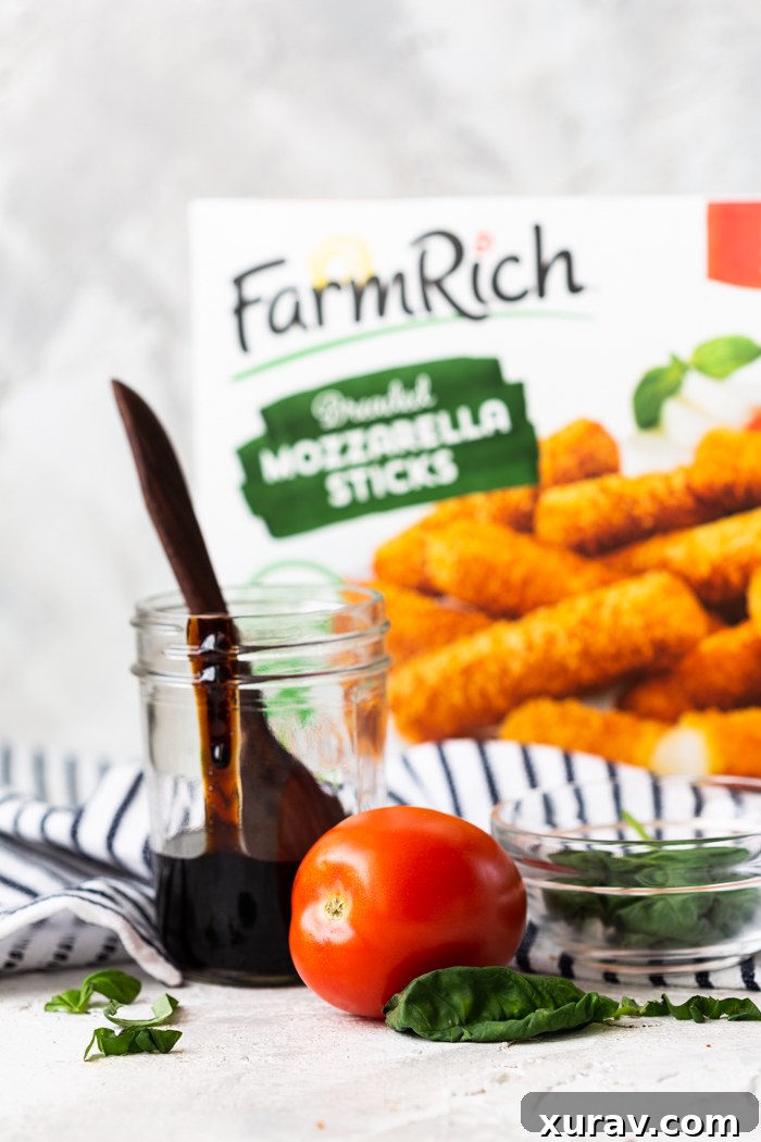 Ingredients for chicken caprese cooked in the air fryer, laid out on a table.