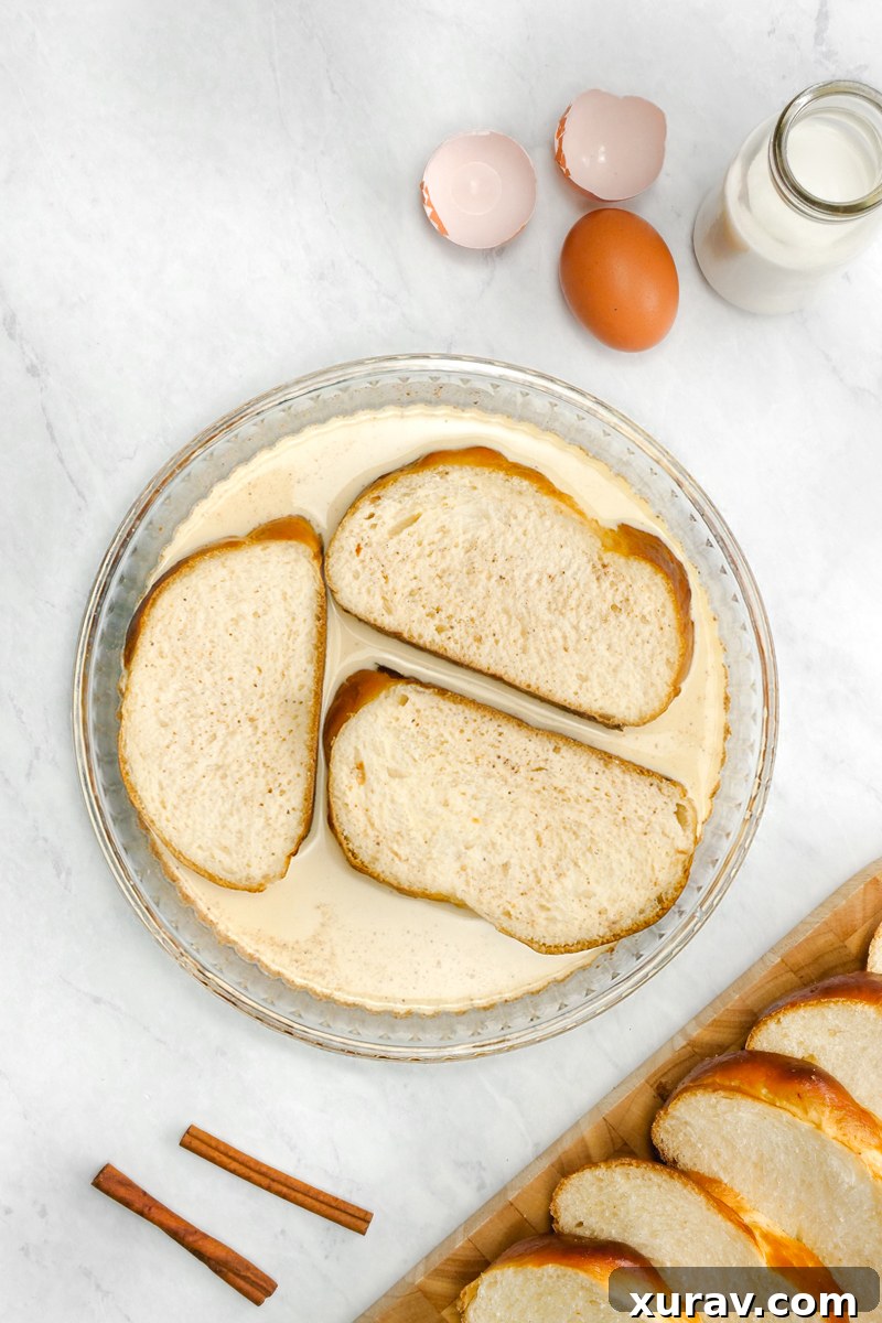 three slices of bread in a thick egg batter for french toast