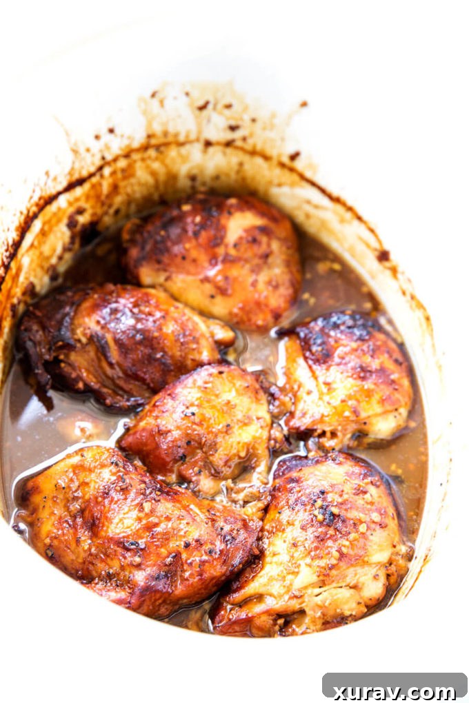 Crockpot Garlic Lime Chicken in marinade fully cooked.