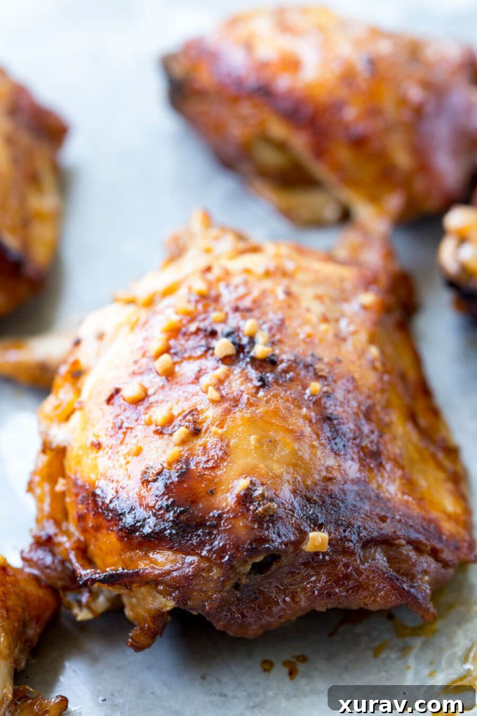 Crockpot Garlic Lime Chicken fully cooked on wax paper.