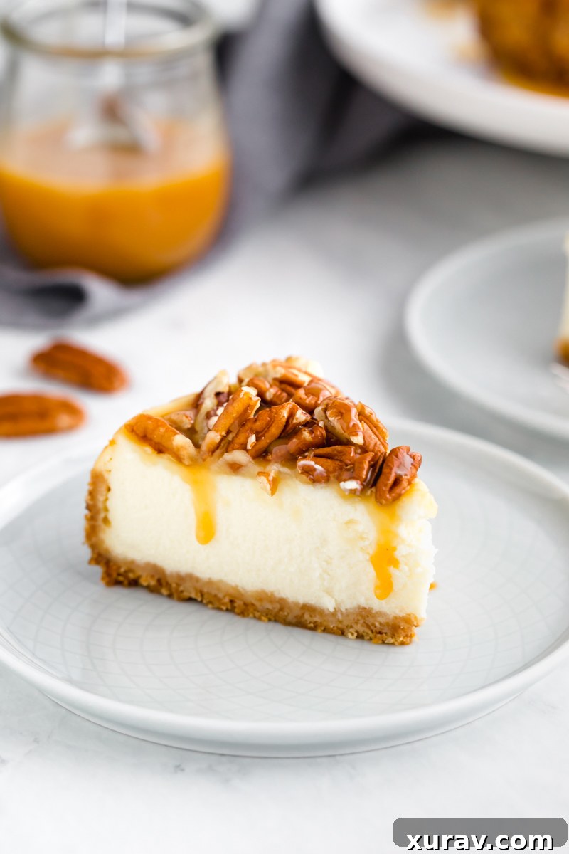 Caramel pecan instant pot cheesecake slice on a white plate