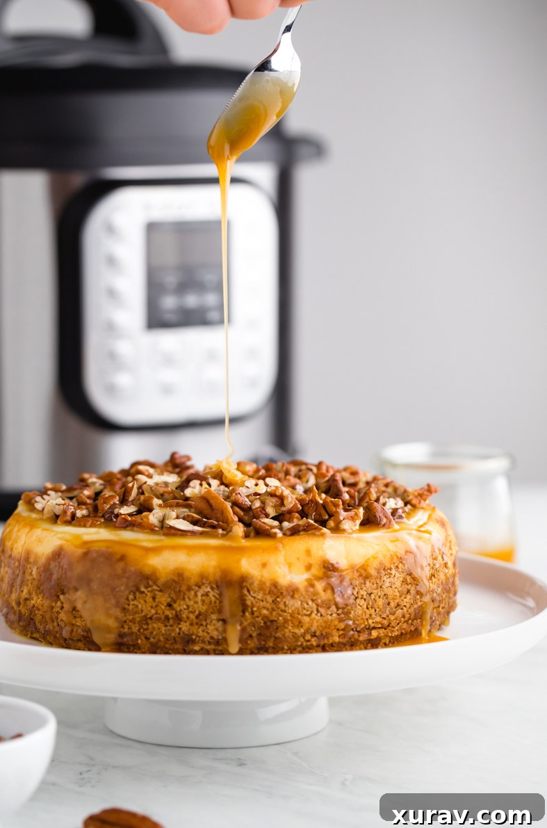 Caramel pecan cheesecake with a drizzle of caramel