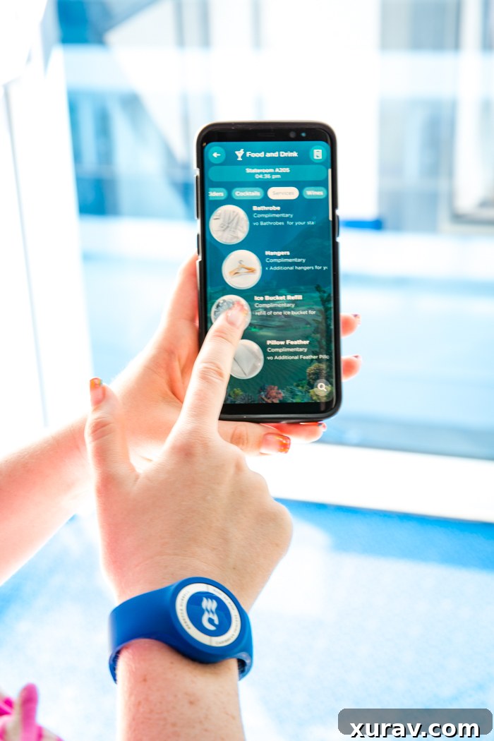 A person wearing the Princess OceanMedallion on their wrist.