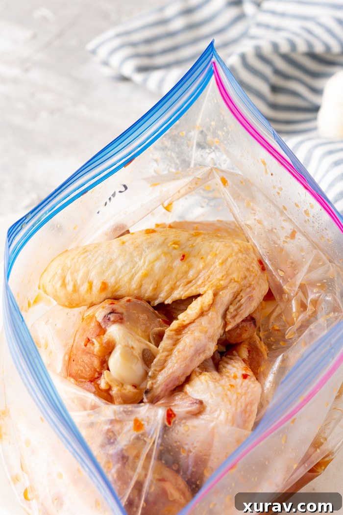 Chili Garlic Marinade in a glass bowl with various spices.