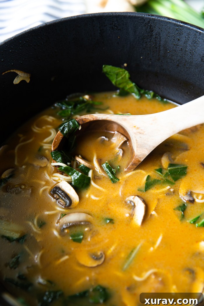 Ramen broth simmering in a pot