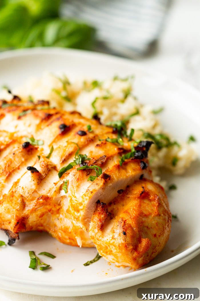 Thai Red Curry Marinade being poured over chicken