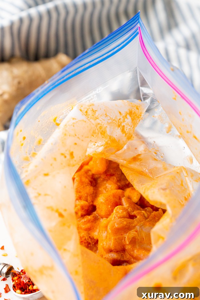 Chicken marinating in Thai Red Curry Marinade