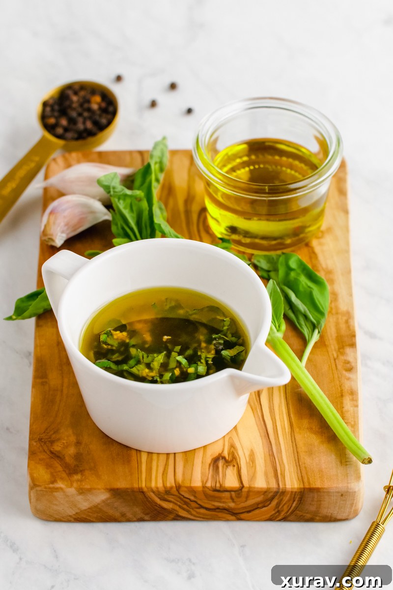 Close-up of corn salad being tossed in a bowl