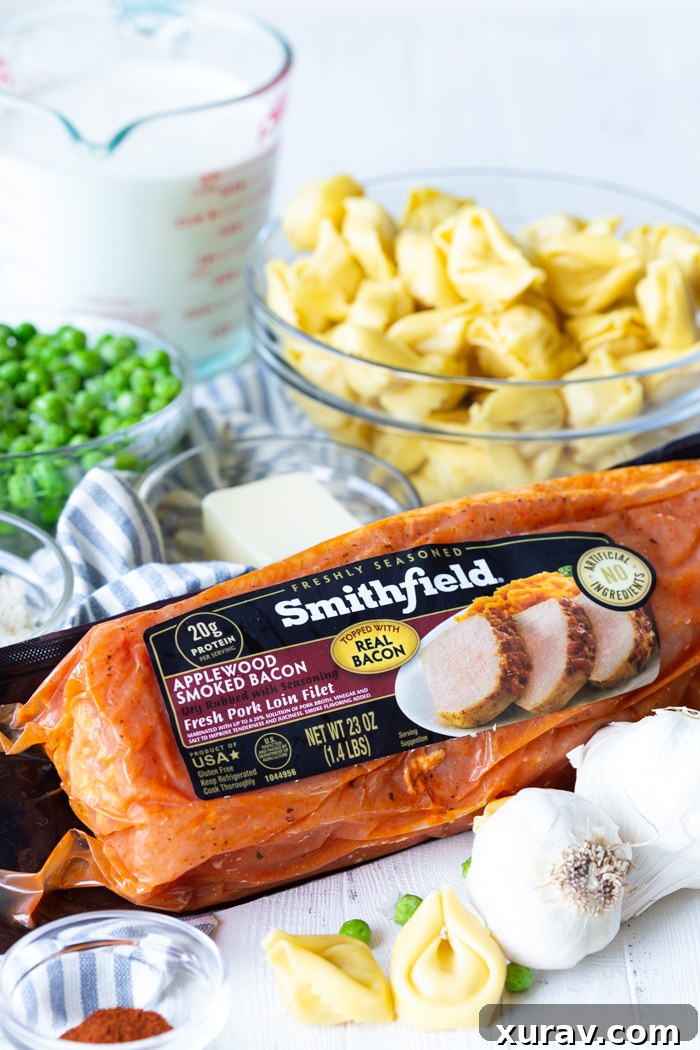 Diced Smithfield marinated pork loin searing in a skillet.